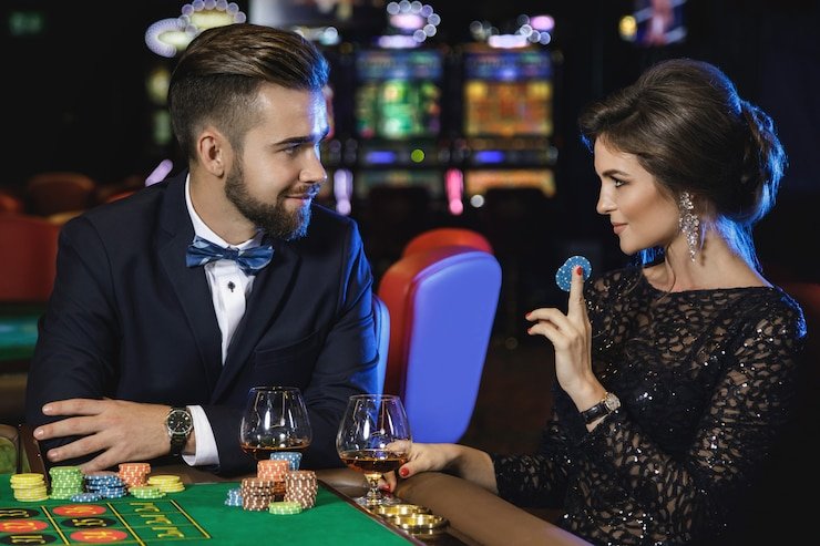 dragonslots live-dealer blackjack table on mobile phone during MotoGP race weekend